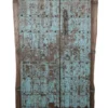 Oude blauwe decoratieve deur op statief