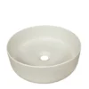 Witte ronde opbouw wasbak