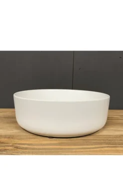 Witte ronde opbouw wasbak